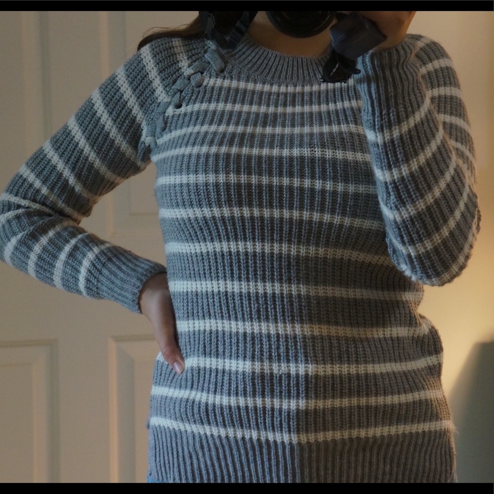 Gray sweater with white stripes